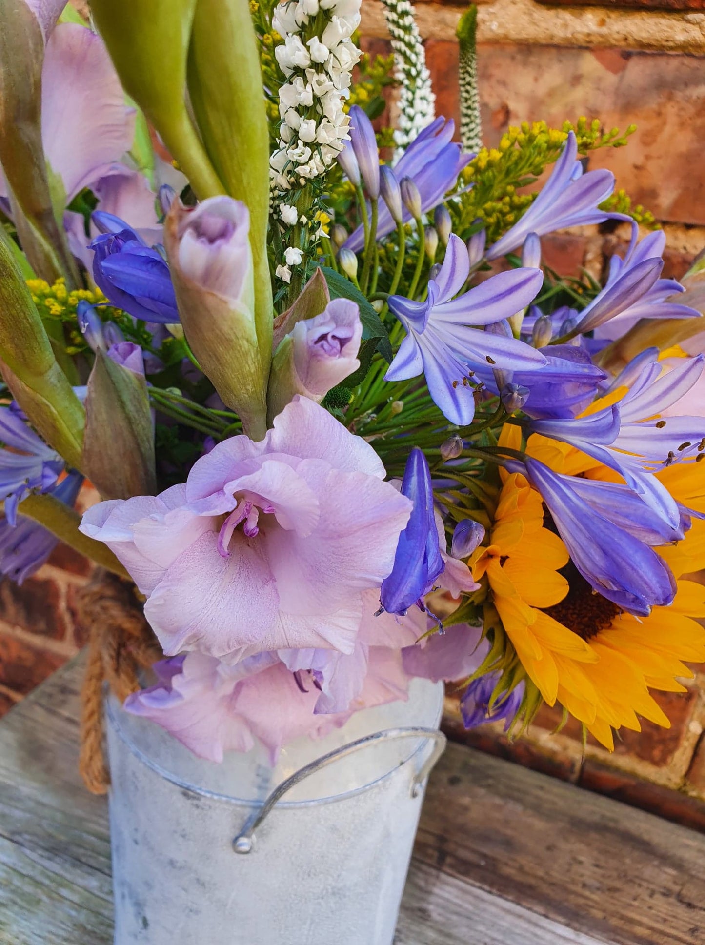 Florist's Choice Seasonal Hand Tied Bouquet In Metal Urn