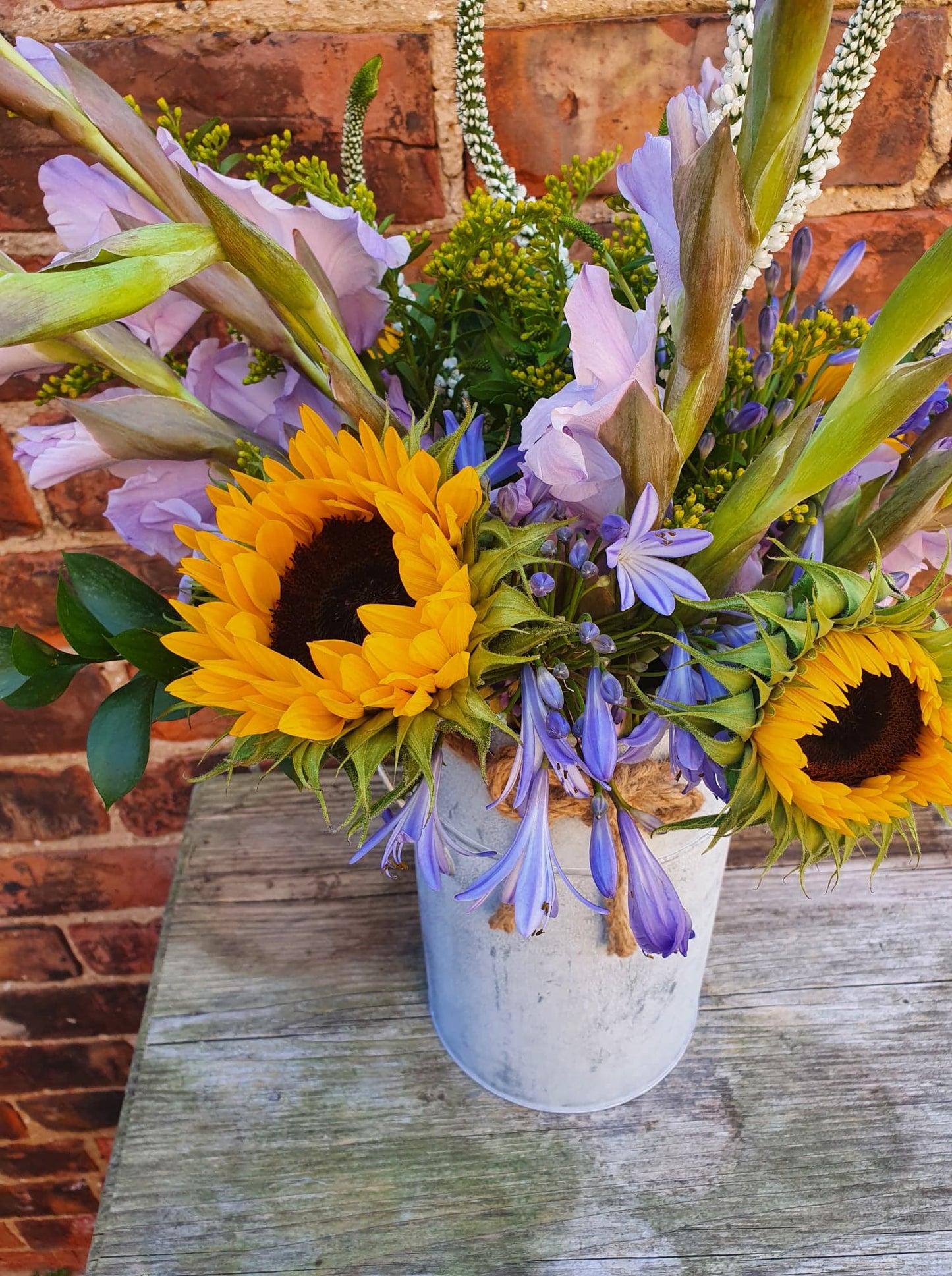 Florist's Choice Seasonal Hand Tied Bouquet In Metal Urn