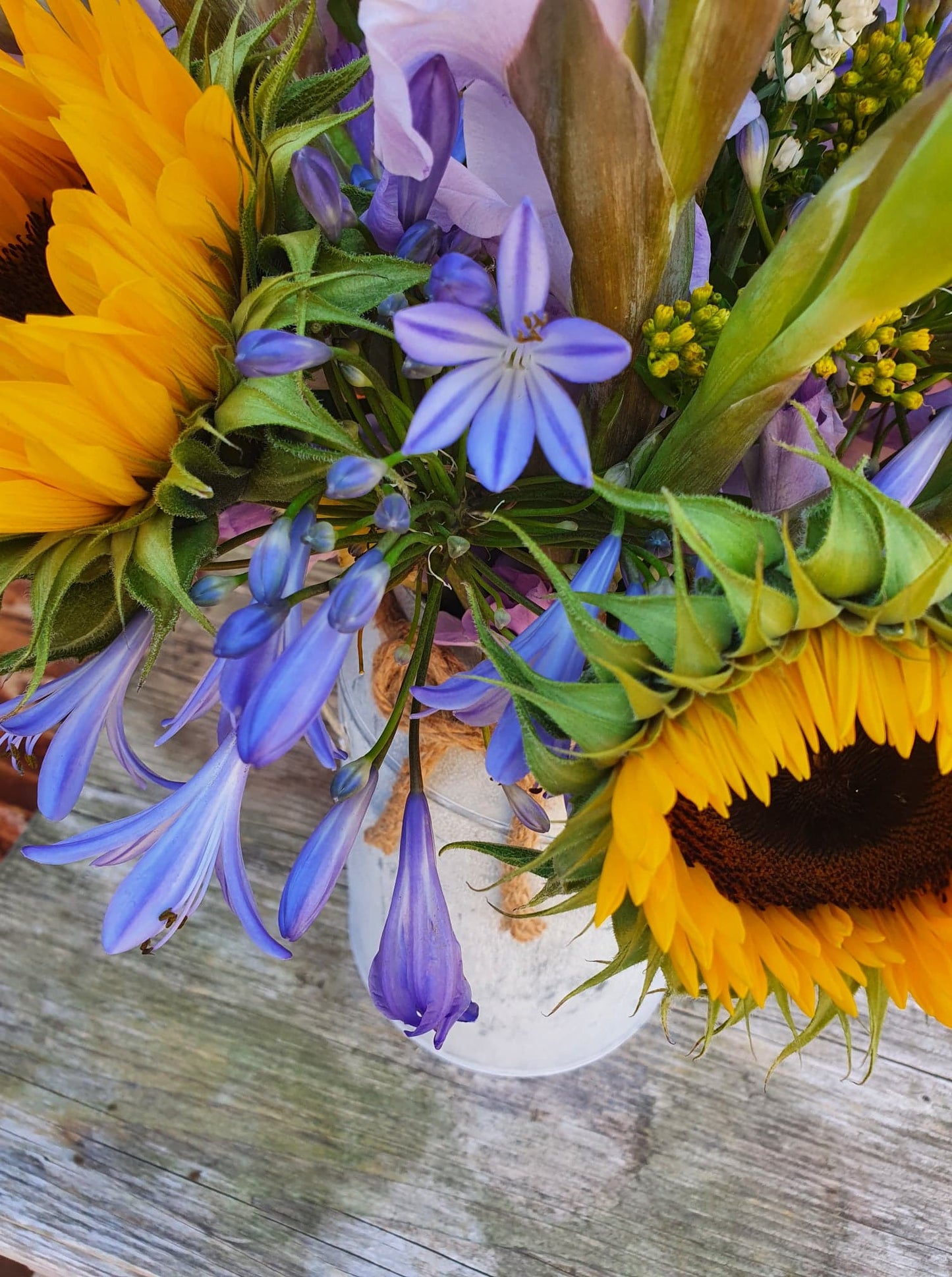 Florist's Choice Seasonal Hand Tied Bouquet In Metal Urn