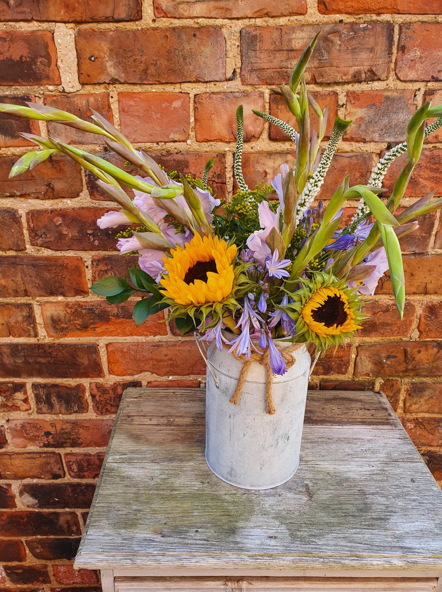 Florist's Choice Seasonal Hand Tied Bouquet In Metal Urn