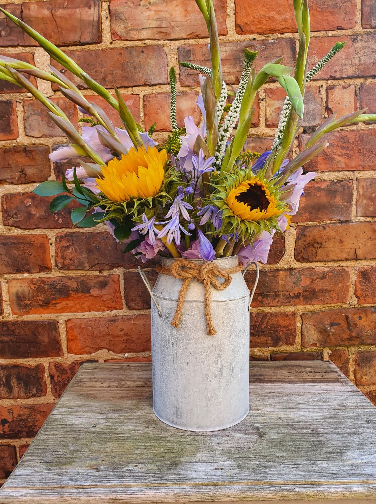 Florist's Choice Seasonal Hand Tied Bouquet In Metal Urn