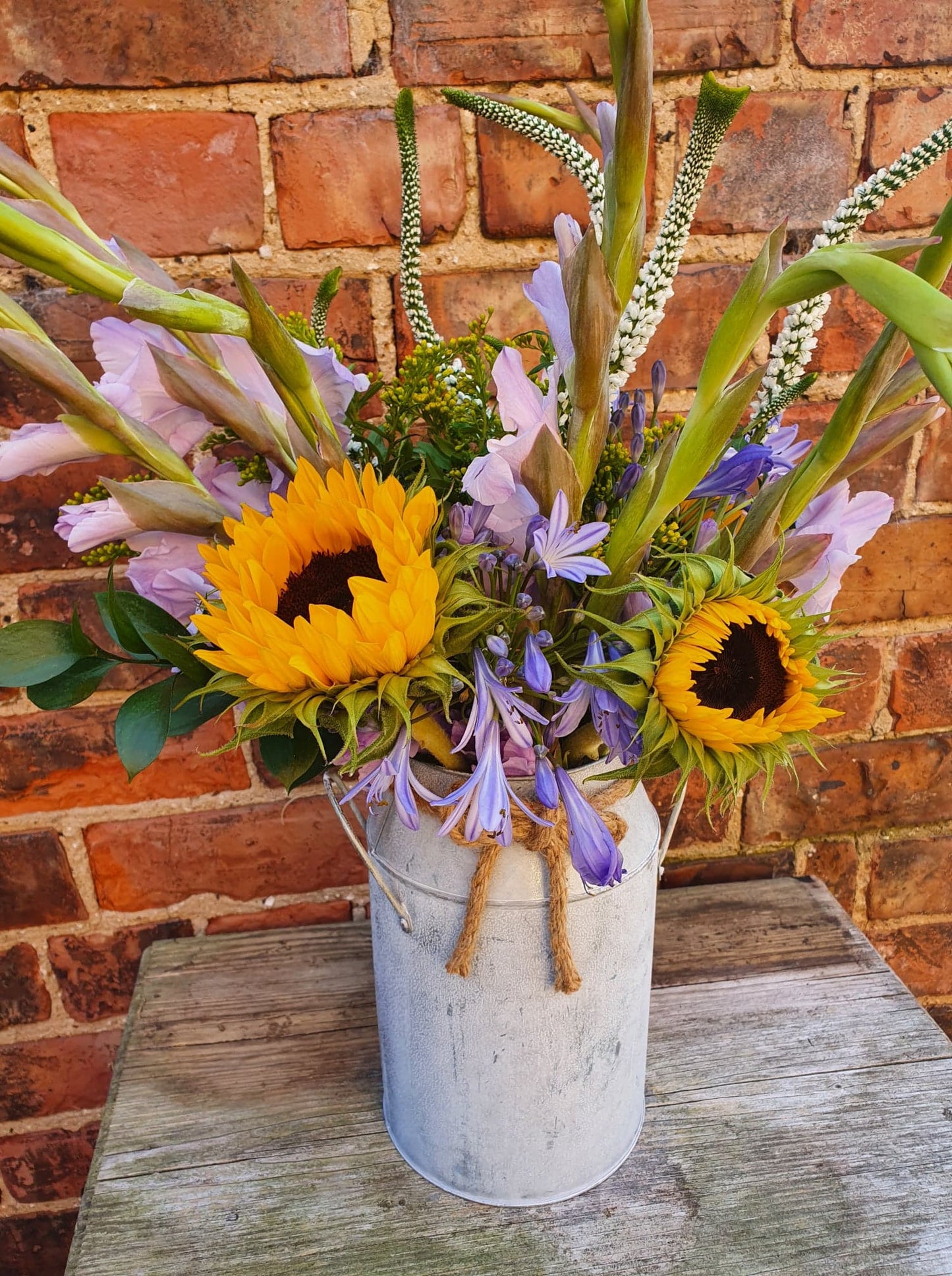 Florist's Choice Seasonal Hand Tied Bouquet In Metal Urn